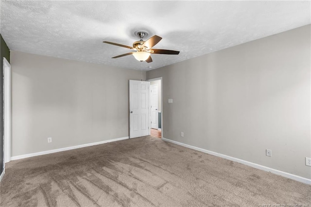 1419 Acacia Dr, Fayetteville, NC 28314 - spare room with ceiling fan, carpet floors, a textured ceiling, and baseboards