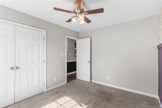 1419 Acacia Dr, Fayetteville, NC 28314 - unfurnished bedroom with carpet, baseboards, a ceiling fan, and a closet