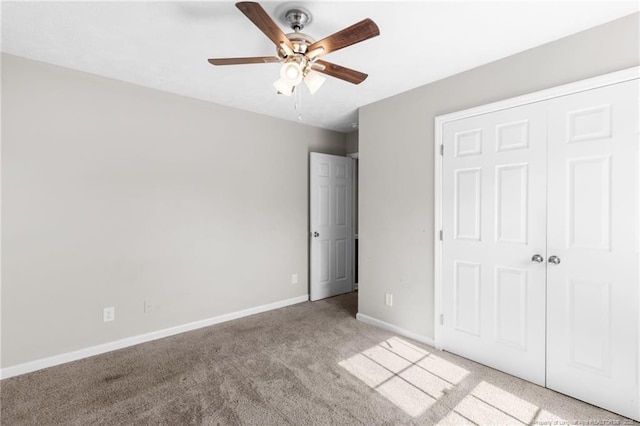 1419 Acacia Dr, Fayetteville, NC 28314 - unfurnished bedroom featuring carpet floors, baseboards, a closet, and a ceiling fan