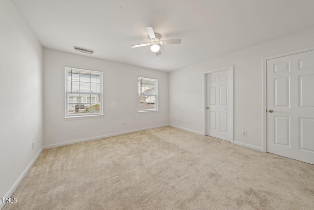285 Plaza Dr Unit C, Chapel Hill, NC 27517 - unfurnished bedroom featuring carpet flooring, baseboards, and a ceiling fan