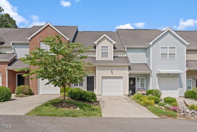 285 Plaza Dr Unit C, Chapel Hill, NC 27517 - view of property with driveway, a garage, and roof with shingles