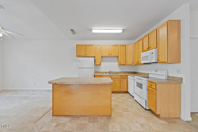 285 Plaza Dr Unit C, Chapel Hill, NC 27517 - kitchen featuring white appliances, a sink, a center island, a ceiling fan, and light countertops
