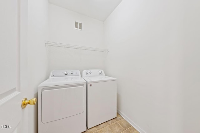 285 Plaza Dr Unit C, Chapel Hill, NC 27517 - laundry area featuring washer and dryer and baseboards
