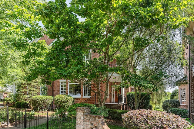 218 W Barbee Chapel Rd, Chapel Hill, NC 27517 - view of property hidden behind natural elements featuring brick siding