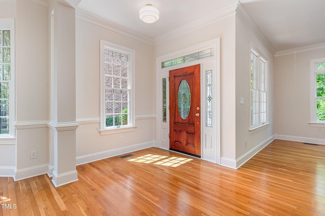 218 W Barbee Chapel Rd, Chapel Hill, NC 27517 - foyer entrance featuring light wood-type flooring, baseboards, and ornamental molding