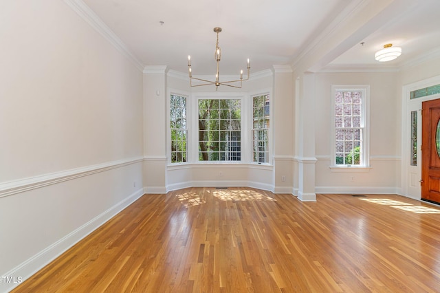 218 W Barbee Chapel Rd, Chapel Hill, NC 27517 - entryway featuring a chandelier, light wood finished floors, plenty of natural light, baseboards, and crown molding