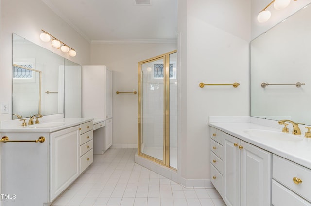218 W Barbee Chapel Rd, Chapel Hill, NC 27517 - full bathroom with two vanities, crown molding, a stall shower, tile patterned floors, and baseboards