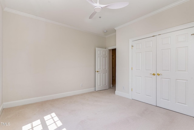 218 W Barbee Chapel Rd, Chapel Hill, NC 27517 - unfurnished bedroom with light colored carpet, crown molding, a closet, baseboards, and ceiling fan