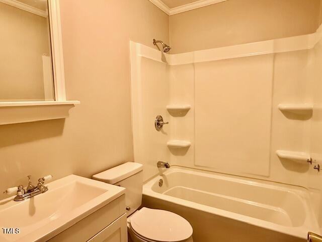 1007 Driftwood Dr, Siler City, NC 27344 - bathroom featuring crown molding,  shower combination, and vanity
