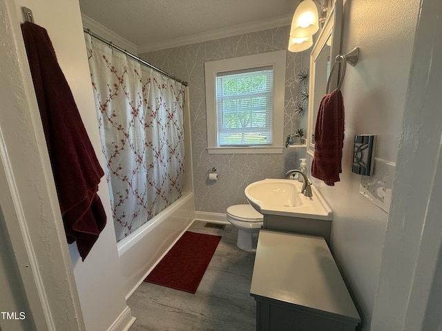 306 W Canary St, Dunn, NC 28334 - bathroom with ornamental molding, toilet, vanity, shower / bath combination with curtain, and wood finished floors
