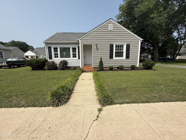 306 W Canary St, Dunn, NC 28334 - view of front of house with a front lawn