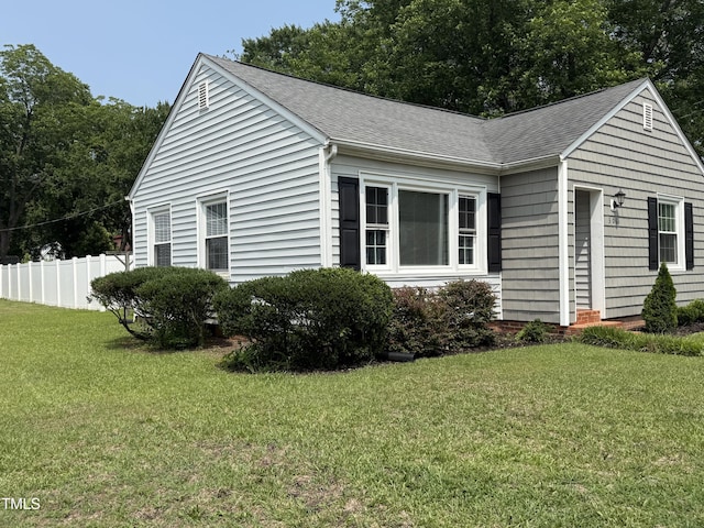 306 W Canary St, Dunn, NC 28334 - view of side of home featuring a shingled roof