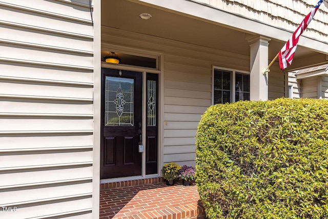 215 Dungarven Loop, Cary, NC 27513 - doorway to property with covered porch
