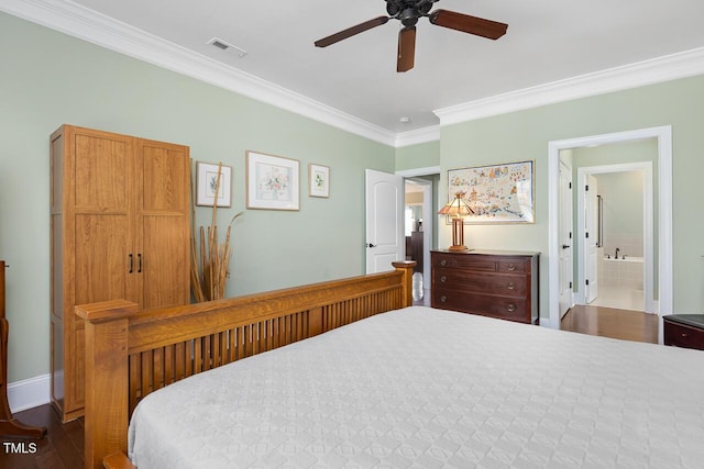 215 Dungarven Loop, Cary, NC 27513 - bedroom featuring crown molding, baseboards, wood finished floors, a ceiling fan, and connected bathroom
