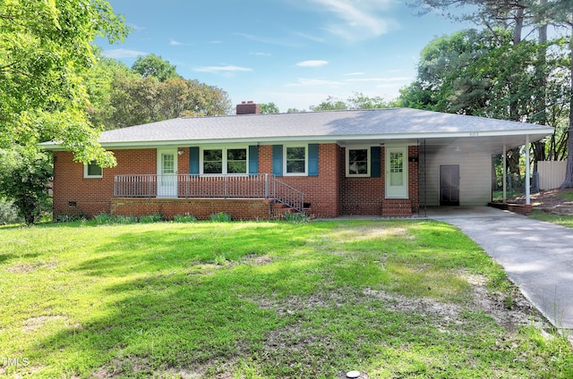 603 Nellane Dr, Garner, NC 27529 - ranch-style house featuring a front yard, driveway, a chimney, a carport, and brick siding