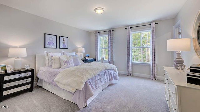 669 Sun Meadow Dr, Wake Forest, NC 27587 - bedroom featuring light colored carpet and baseboards