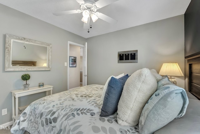 115 E Seve Ct, Morrisville, NC 27560 - bedroom with a ceiling fan and baseboards