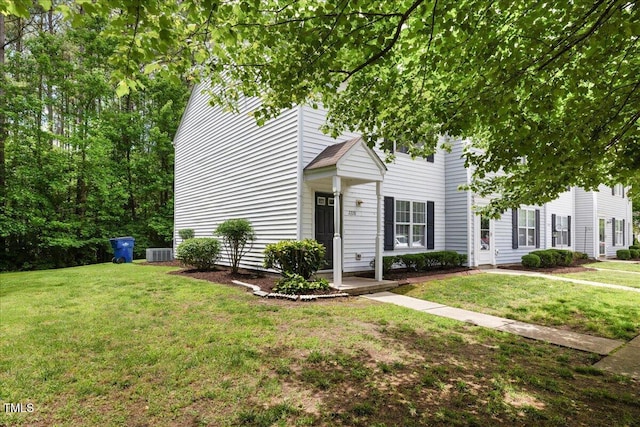 2228 Walnut Ridge Ct, Raleigh, NC 27610 - view of front facade with central air condition unit and a front lawn