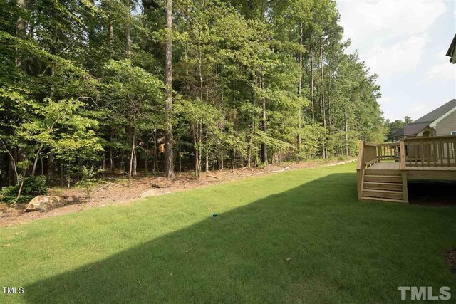 105 Everam Ct, Chapel Hill, NC 27516 - view of green lawn with a deck