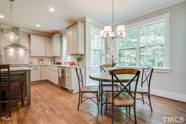 105 Everam Ct, Chapel Hill, NC 27516 - kitchen with wall chimney range hood, ornamental molding, a sink, backsplash, and stainless steel dishwasher