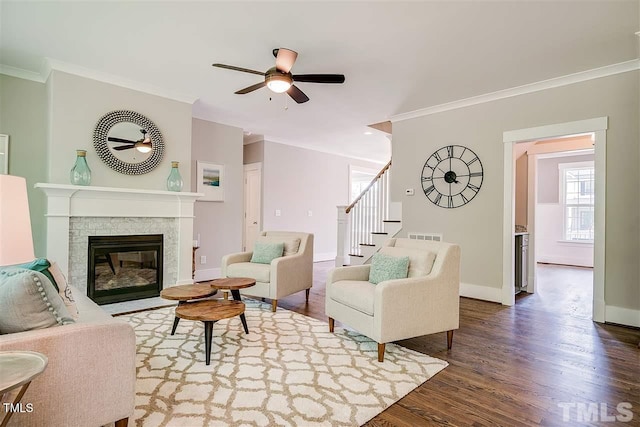 105 Everam Ct, Chapel Hill, NC 27516 - living room featuring a ceiling fan, crown molding, wood finished floors, stairs, and baseboards
