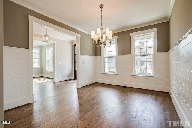 105 Everam Ct, Chapel Hill, NC 27516 - empty room featuring wainscoting, a chandelier, dark wood-style floors, crown molding, and baseboards