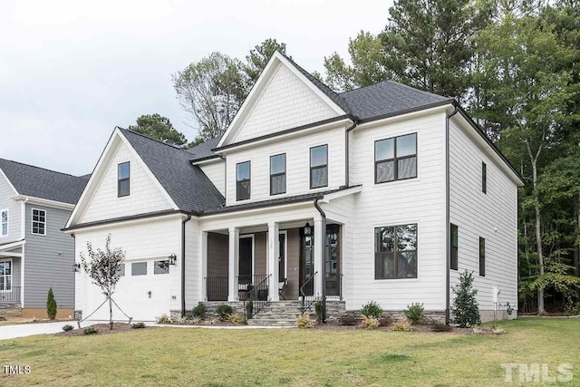 105 Everam Ct, Chapel Hill, NC 27516 - view of front of property with a porch, a front lawn, driveway, and roof with shingles