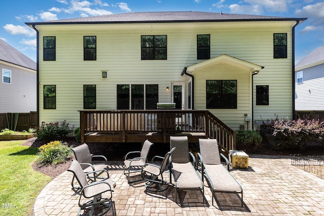 105 Everam Ct, Chapel Hill, NC 27516 - back of property with a patio and a wooden deck