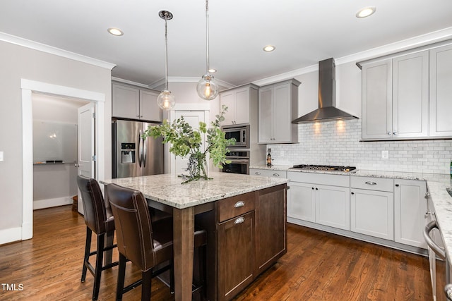 105 Everam Ct, Chapel Hill, NC 27516 - kitchen featuring wall chimney range hood, appliances with stainless steel finishes, ornamental molding, tasteful backsplash, and light stone counters