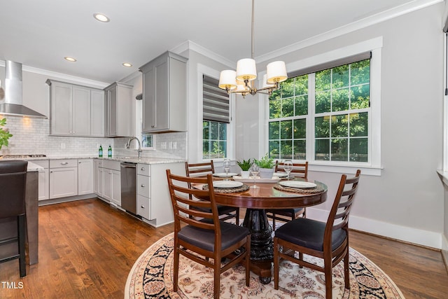 105 Everam Ct, Chapel Hill, NC 27516 - dining room with ornamental molding, plenty of natural light, dark wood-style floors, a chandelier, and baseboards