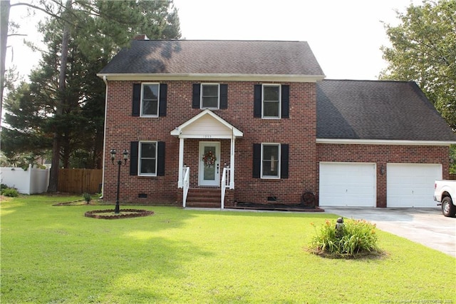 1955 Fairforest Dr, Fayetteville, NC 28304 - colonial inspired home featuring an attached garage, driveway, roof with shingles, and brick siding