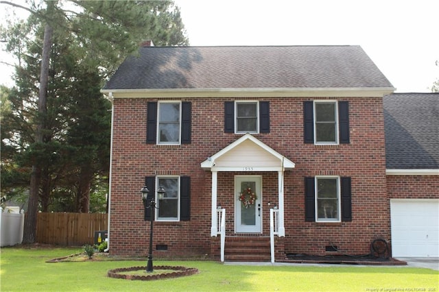 1955 Fairforest Dr, Fayetteville, NC 28304 - view of front of house featuring roof with shingles, brick siding, and a garage