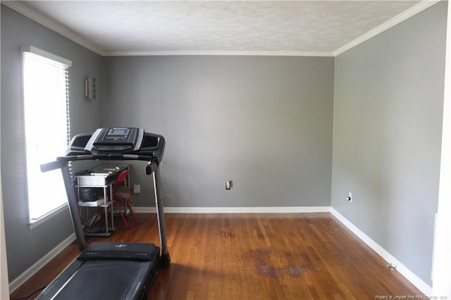 1955 Fairforest Dr, Fayetteville, NC 28304 - exercise area with wood finished floors, baseboards, and ornamental molding