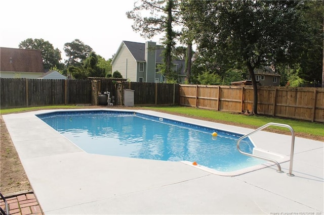 1955 Fairforest Dr, Fayetteville, NC 28304 - view of swimming pool with a fenced backyard and a patio area