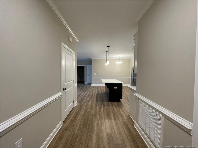 220 Gallery Dr Unit 201, Spring Lake, NC 28390 - hall featuring crown molding, dark wood-style floors, a chandelier, and baseboards