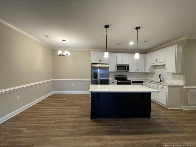220 Gallery Dr Unit 201, Spring Lake, NC 28390 - kitchen with appliances with stainless steel finishes, a sink, a kitchen island, a chandelier, and white cabinetry