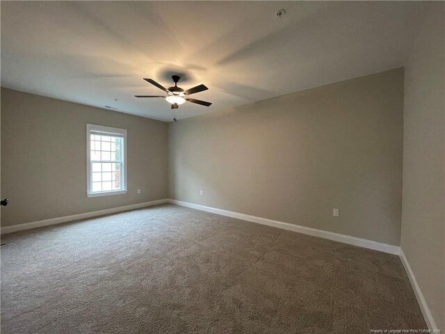 220 Gallery Dr Unit 201, Spring Lake, NC 28390 - carpeted empty room featuring baseboards and a ceiling fan