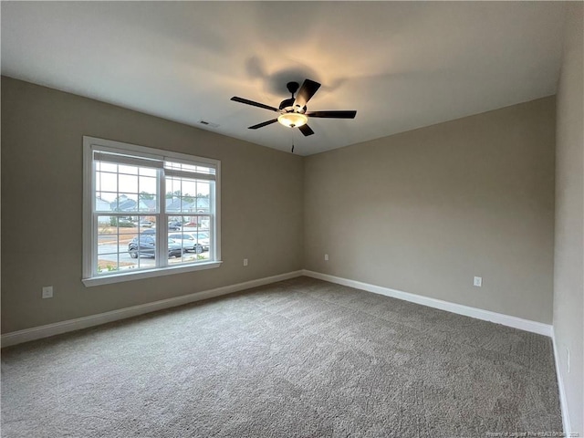 220 Gallery Dr Unit 201, Spring Lake, NC 28390 - carpeted spare room with a ceiling fan and baseboards