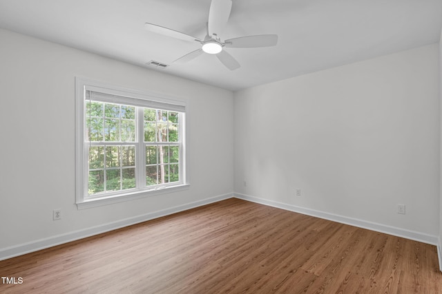 2575 Primrose Ln, Creedmoor, NC 27522 - empty room featuring wood finished floors and a ceiling fan