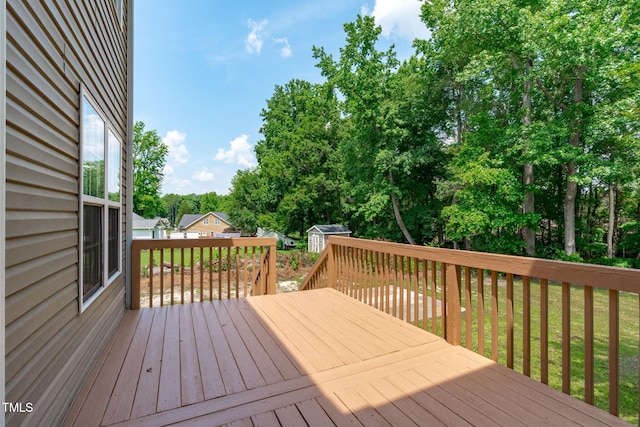 2575 Primrose Ln, Creedmoor, NC 27522 - wooden terrace with a shed, view of scattered trees, and a lawn