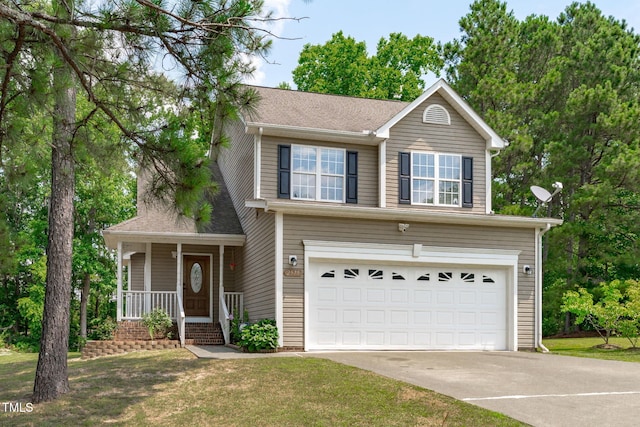 2575 Primrose Ln, Creedmoor, NC 27522 - traditional-style house with a garage, concrete driveway, a porch, and a front lawn