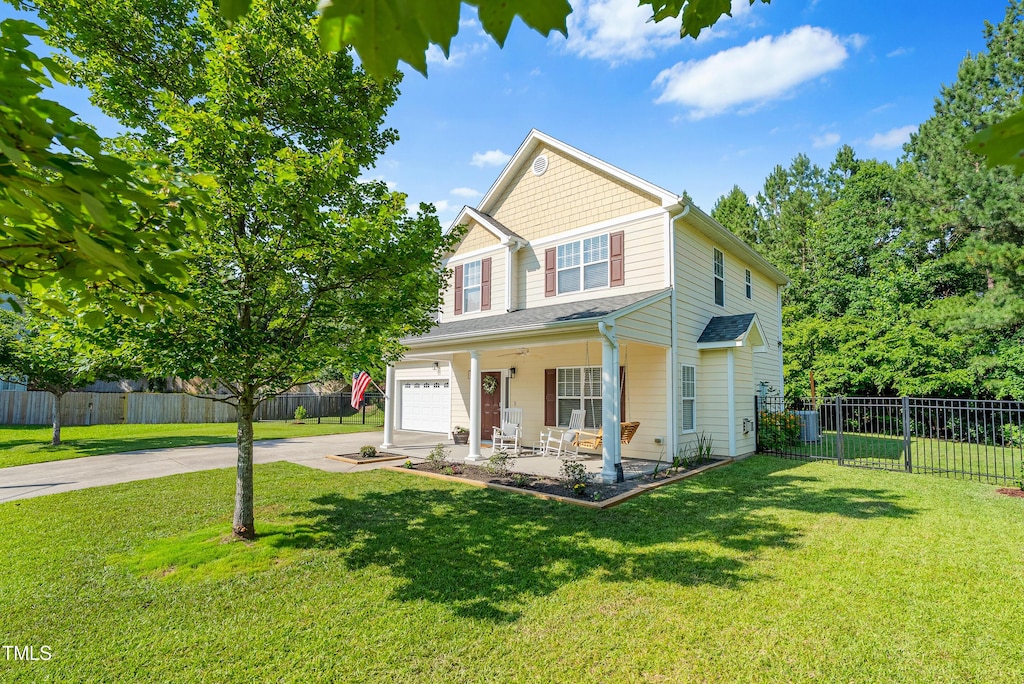 303 Sylvias Ct, Durham, NC 27703 - view of front of home featuring concrete driveway and covered porch