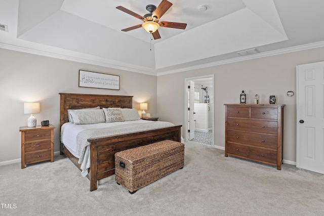 107 Trackimire Ln, Apex, NC 27539 - bedroom with a tray ceiling, light colored carpet, baseboards, crown molding, and connected bathroom
