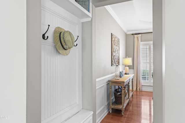 107 Trackimire Ln, Apex, NC 27539 - hallway featuring crown molding, wood finished floors, and a wainscoted wall