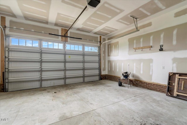 131 Hawick Ct, Zebulon, NC 27597 - garage featuring a garage door opener