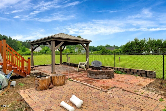 131 Hawick Ct, Zebulon, NC 27597 - view of patio with an outdoor fire pit and a gazebo