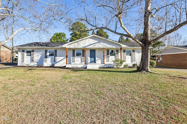 1246 NC-27, Benson, NC 27504 - ranch-style house with a front yard and brick siding