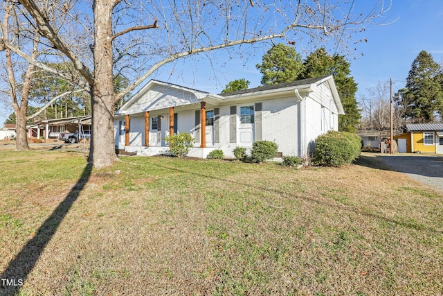 1246 NC-27, Benson, NC 27504 - ranch-style house featuring covered porch, a front yard, and brick siding