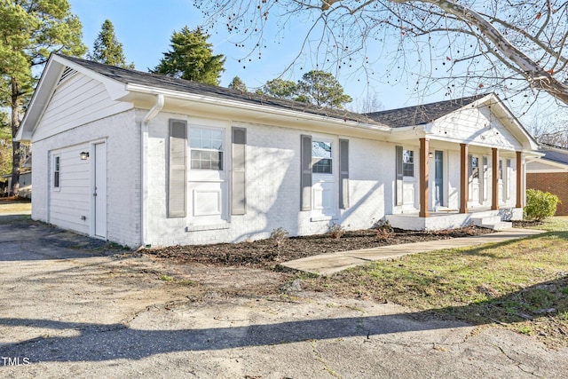 1246 NC-27, Benson, NC 27504 - ranch-style house with brick siding and a porch