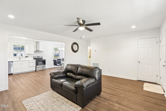 1246 NC-27, Benson, NC 27504 - living area with a ceiling fan, wood finished floors, recessed lighting, and baseboards